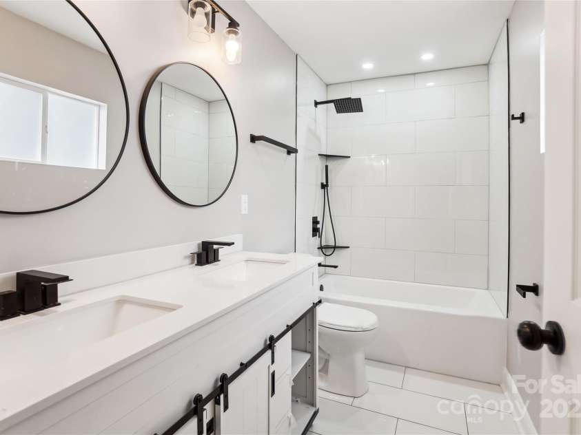 1105 Stanback Road, Chester, SC 29706.  MLS# CAR4212458, YatesRealty ID 5047. This spacious bathroom features modern fixtures and ample vanity space.