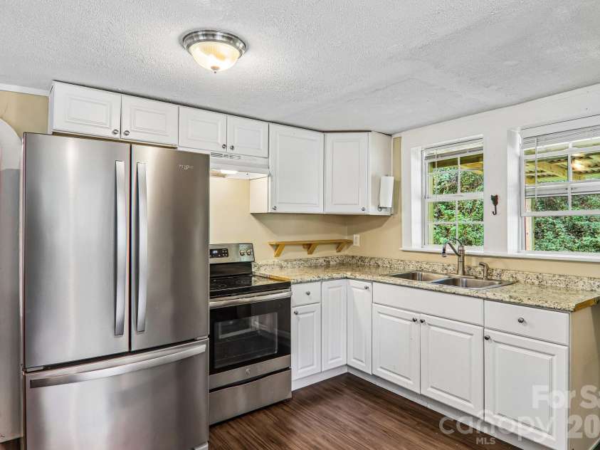 418 Sharptown Road, Canton, NC 28716.  MLS# CAR4421203, YatesRealty ID 50489. 
