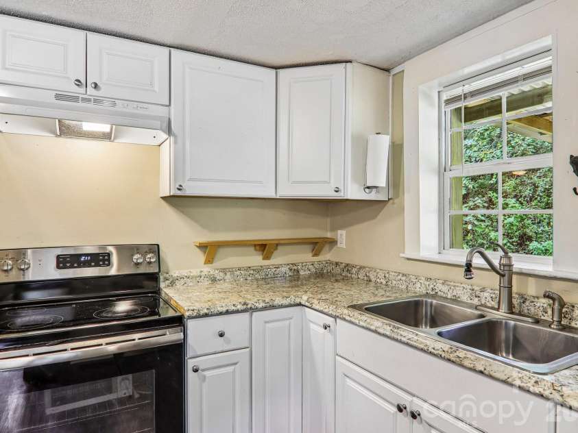 418 Sharptown Road, Canton, NC 28716.  MLS# CAR4421203, YatesRealty ID 50489. 
