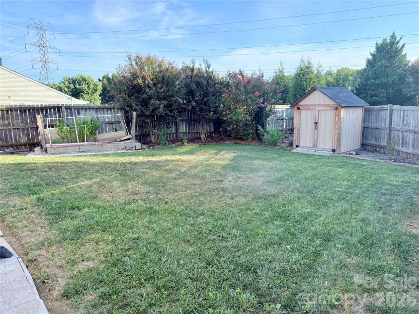 10323 Green Hedge Avenue, Charlotte, NC 28269.  MLS# CAR4419827, YatesRealty ID 50494. 
