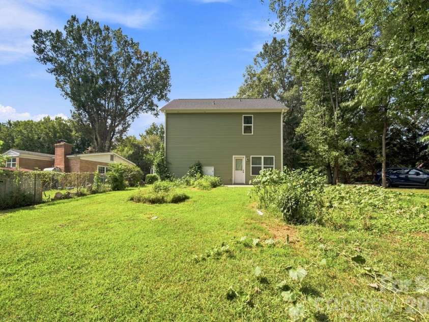 844 Matthews School Road, Matthews, NC 28105.  MLS# CAR4423028, YatesRealty ID 50504. Back Yard