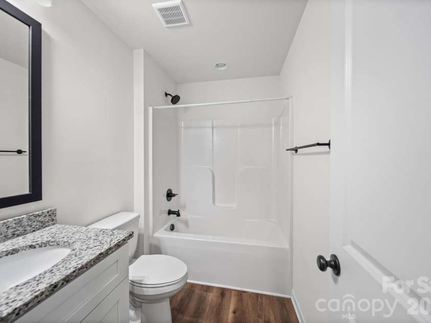 844 Matthews School Road, Matthews, NC 28105.  MLS# CAR4423028, YatesRealty ID 50504. Guest Bathroom