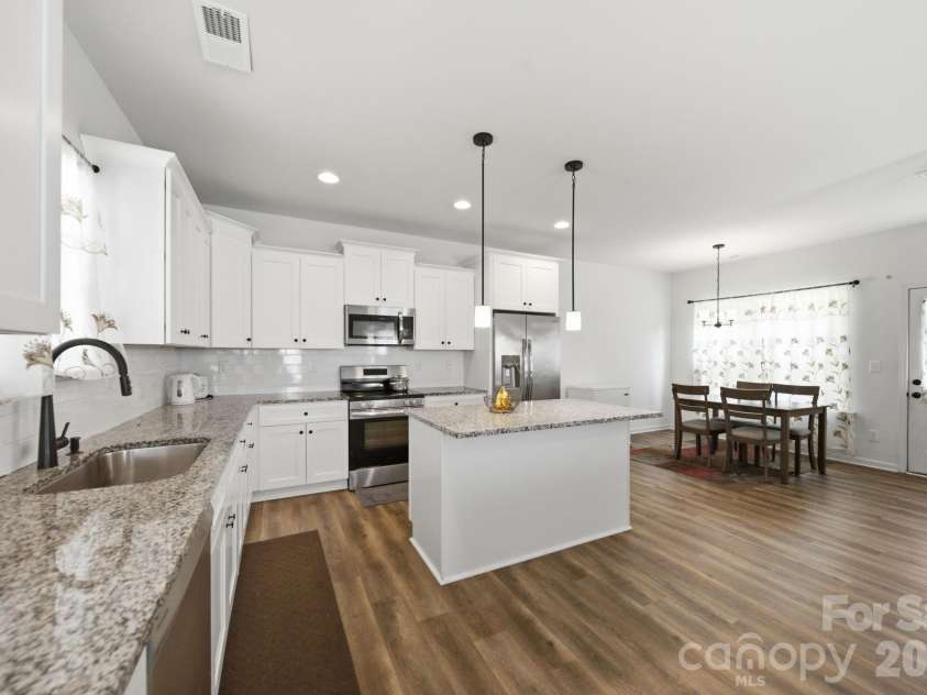 844 Matthews School Road, Matthews, NC 28105.  MLS# CAR4423028, YatesRealty ID 50504. Kitchen