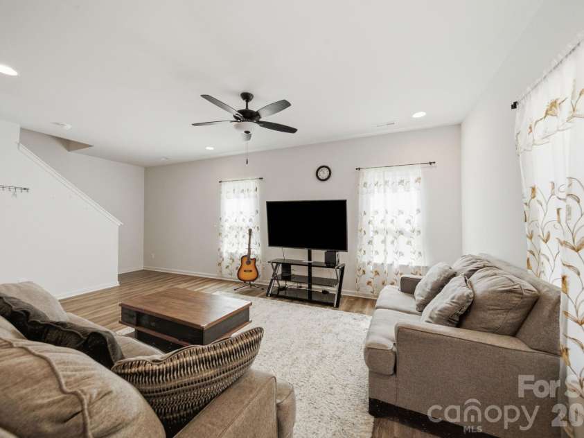844 Matthews School Road, Matthews, NC 28105.  MLS# CAR4423028, YatesRealty ID 50504. Living room
