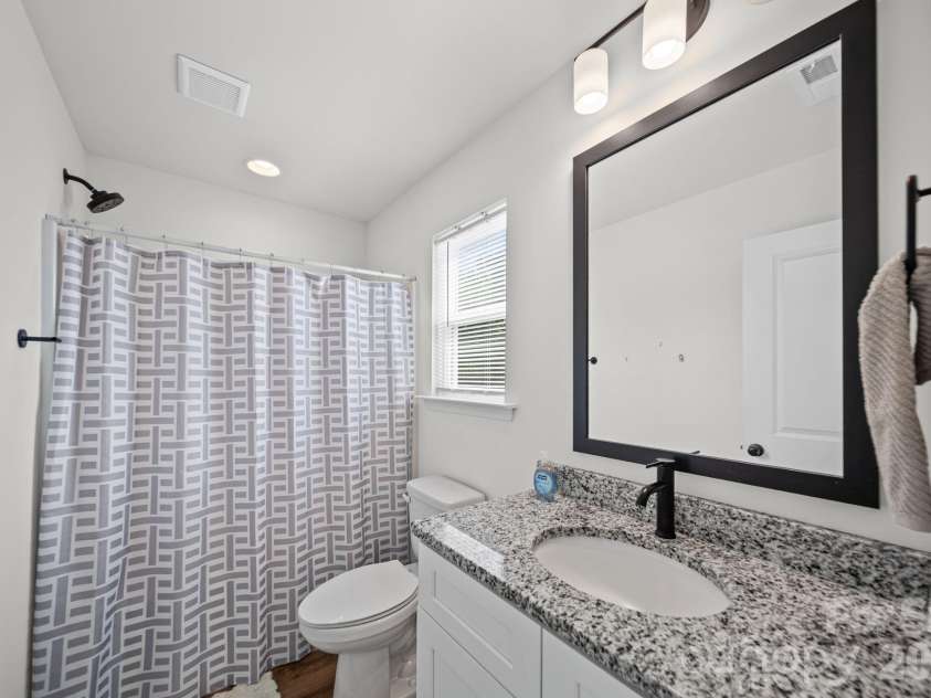 844 Matthews School Road, Matthews, NC 28105.  MLS# CAR4423028, YatesRealty ID 50504. Primary Bathroom