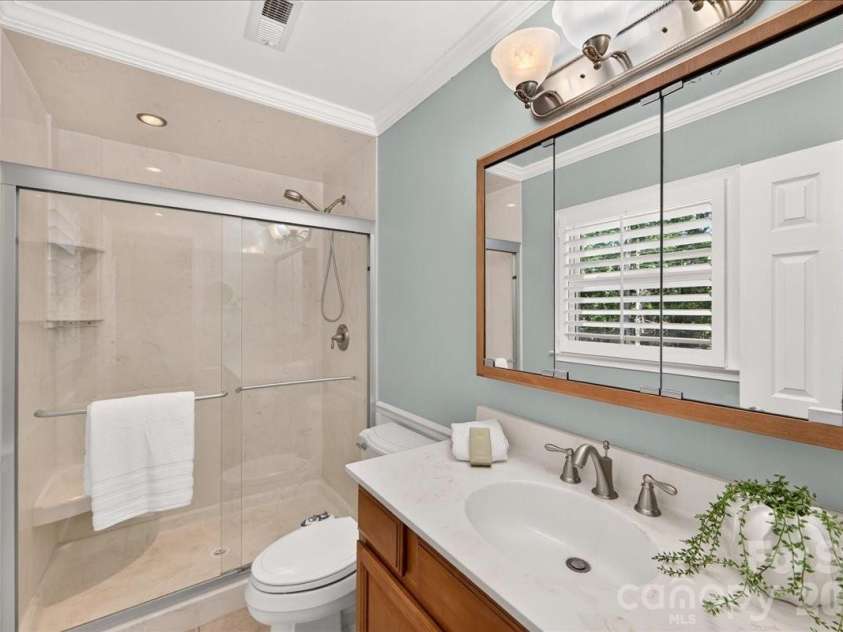 2624 Lawton Bluff Road, Charlotte, NC 28226.  MLS# CAR4423111, YatesRealty ID 50506. Primary bathroom with large tiled shower!
