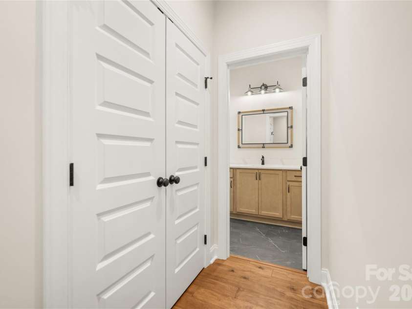 32 Ossarooga Court, Brevard, NC 28712.  MLS# CAR4423106, YatesRealty ID 50509. Linen closet & second bath