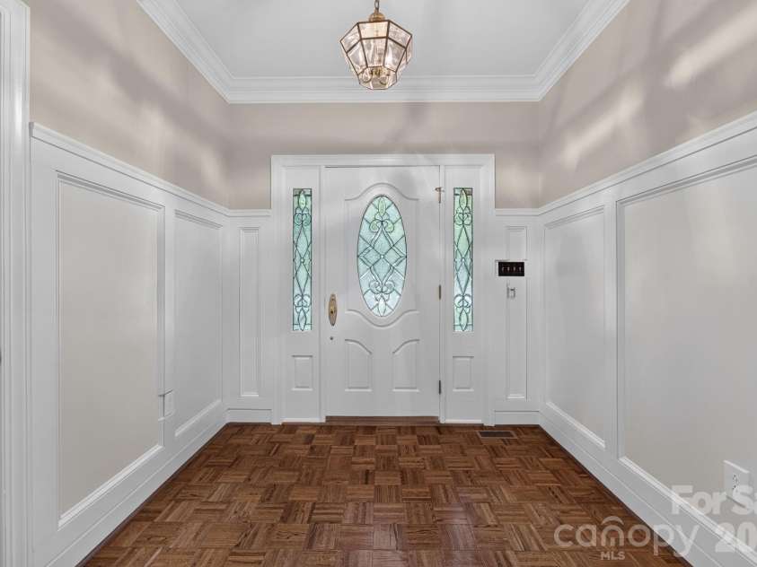 3517 Honeysuckle Drive, Matthews, NC 28104.  MLS# CAR4423576, YatesRealty ID 50513. Hall Entry