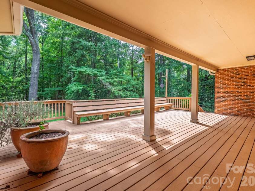 3517 Honeysuckle Drive, Matthews, NC 28104.  MLS# CAR4423576, YatesRealty ID 50513. Partially Covered Expansive Deck