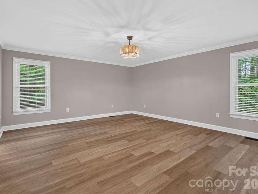 3517 Honeysuckle Drive, Matthews, NC 28104.  MLS# CAR4423576, YatesRealty ID 50513. Primary Bedroom