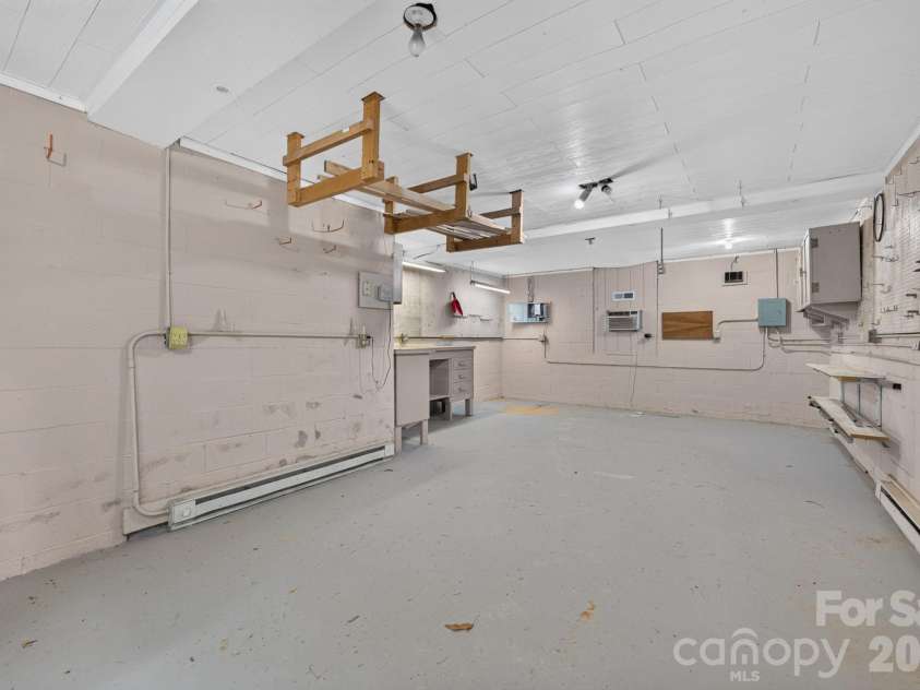3517 Honeysuckle Drive, Matthews, NC 28104.  MLS# CAR4423576, YatesRealty ID 50513. Walk-In Lower Level Workshop