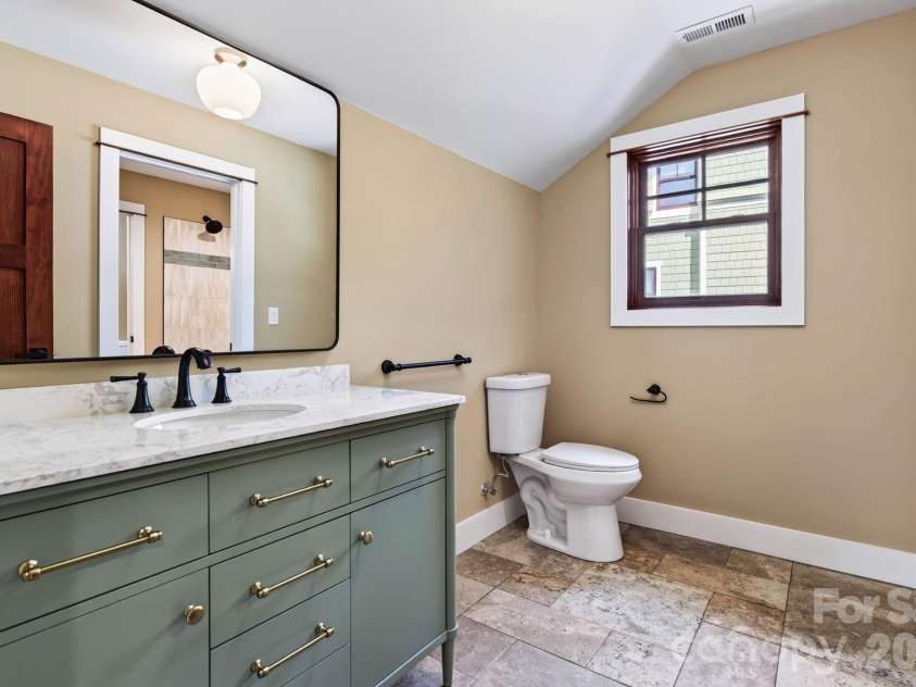 26 Grindstaff Drive, Asheville, NC 28803.  MLS# CAR4423848, YatesRealty ID 50514. 