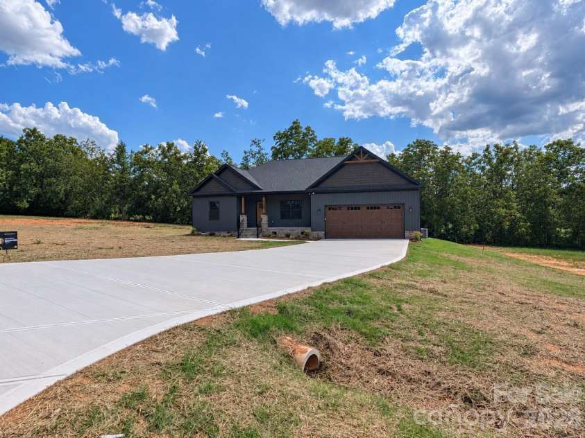 25011 Elias Trails Road, Locust, NC 28097.  MLS# CAR4420599, YatesRealty ID 50518. 
