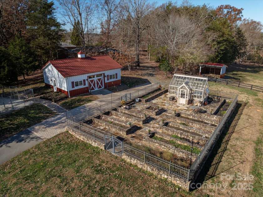 172 Tuckertown Road, New London, NC 28127.  MLS# CAR4215273, YatesRealty ID 5053. English Gardens