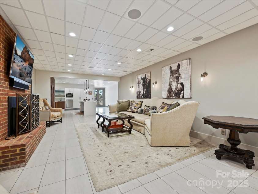 172 Tuckertown Road, New London, NC 28127.  MLS# CAR4215273, YatesRealty ID 5053. Family Room Lower Level