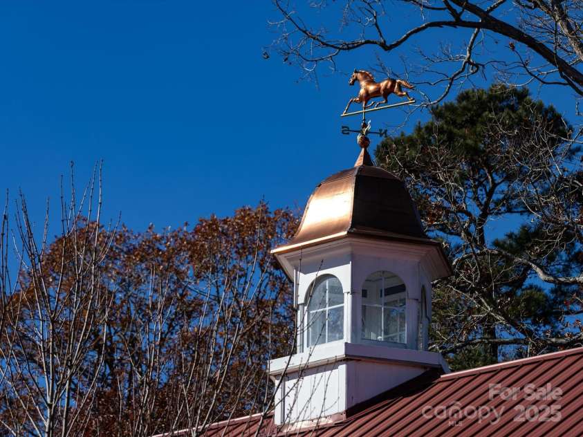 172 Tuckertown Road, New London, NC 28127.  MLS# CAR4215273, YatesRealty ID 5053. Gilded weathervane