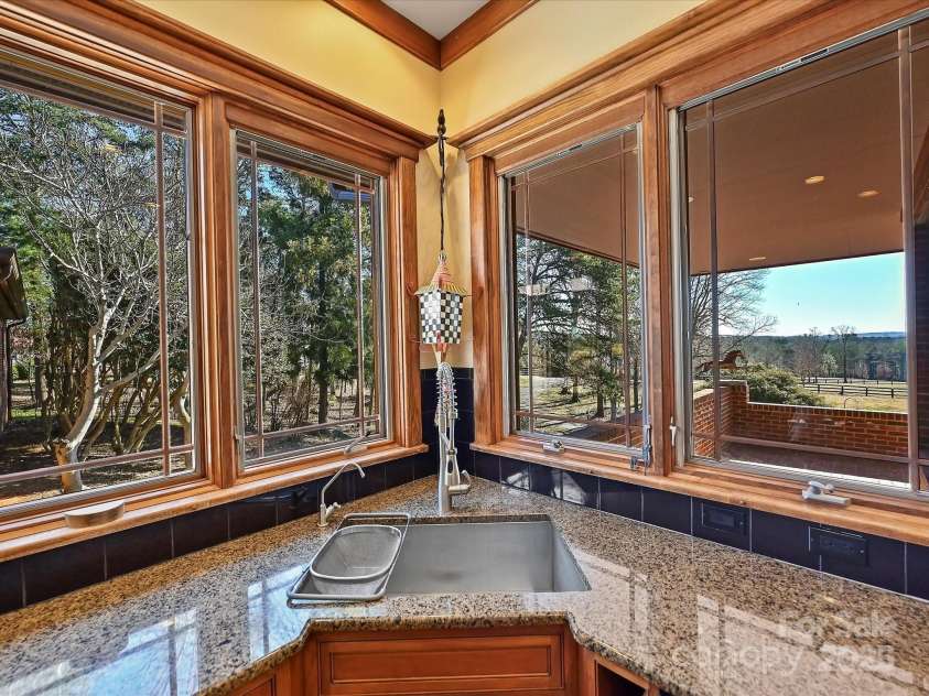 172 Tuckertown Road, New London, NC 28127.  MLS# CAR4215273, YatesRealty ID 5053. Kitchen Window View