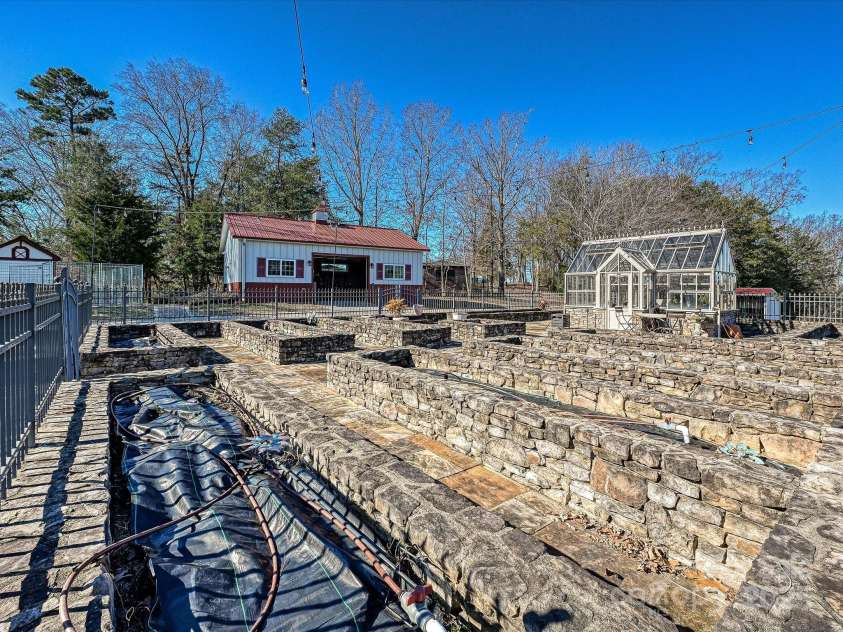 172 Tuckertown Road, New London, NC 28127.  MLS# CAR4215273, YatesRealty ID 5053. Raised Bed English Garden