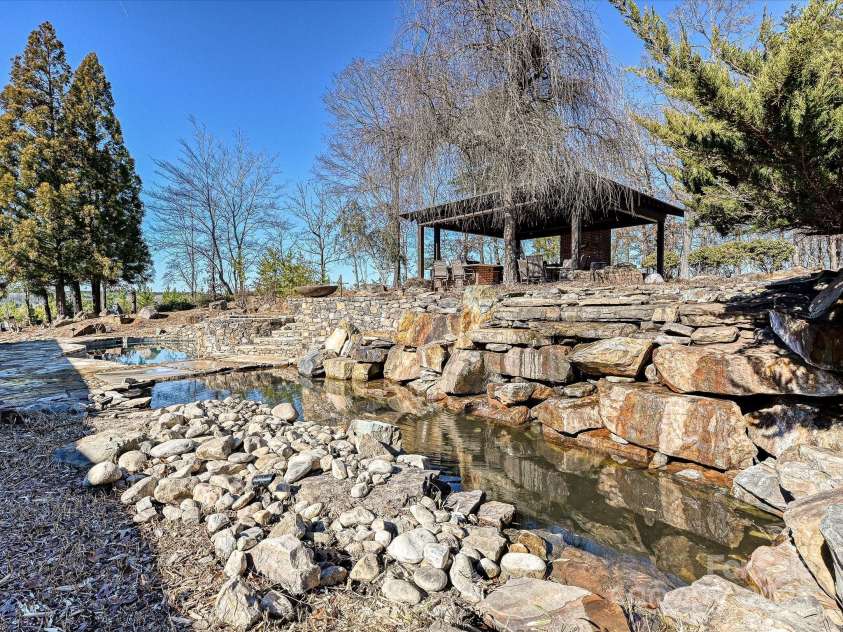 172 Tuckertown Road, New London, NC 28127.  MLS# CAR4215273, YatesRealty ID 5053. Waterfall and Pools