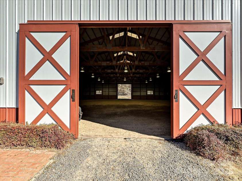 172 Tuckertown Road, New London, NC 28127.  MLS# CAR4215273, YatesRealty ID 5053. Wide Pass-through Doors to Indoor Arena