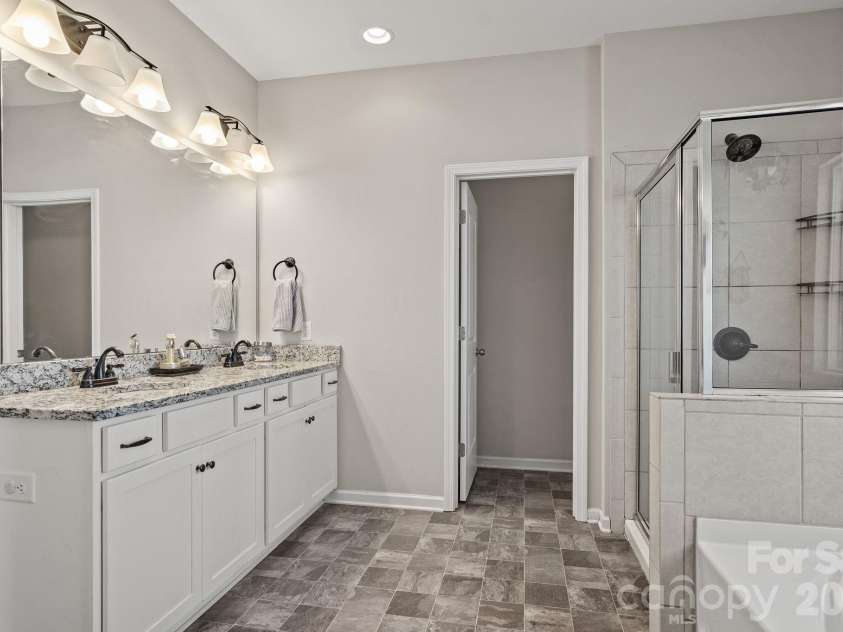 520 Stickley Place, Lancaster, SC 29720.  MLS# CAR4422538, YatesRealty ID 50531. Primary bathroom
