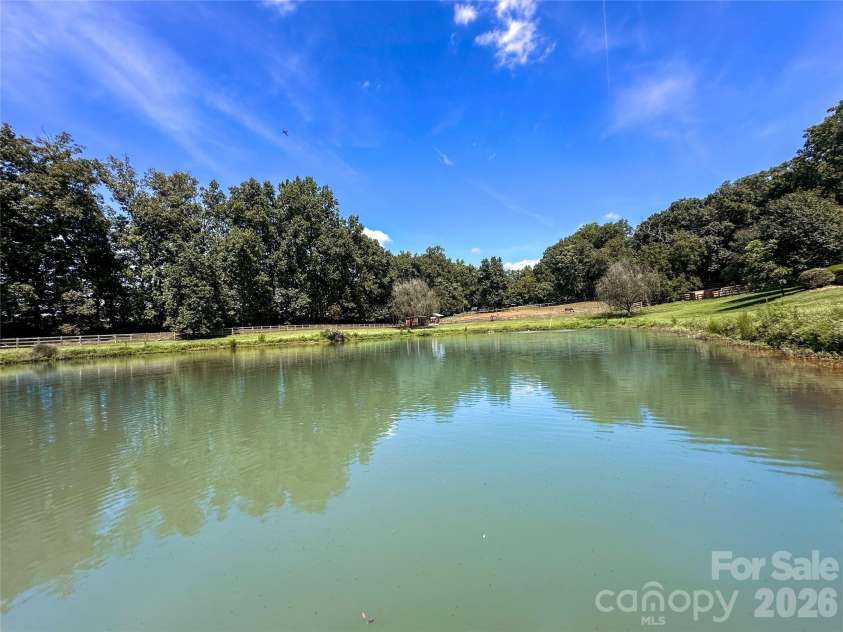 2985 Bradshaw Road, Mooresville, NC 28115.  MLS# CAR4417280, YatesRealty ID 50532. Your stocked 2 acre pond!