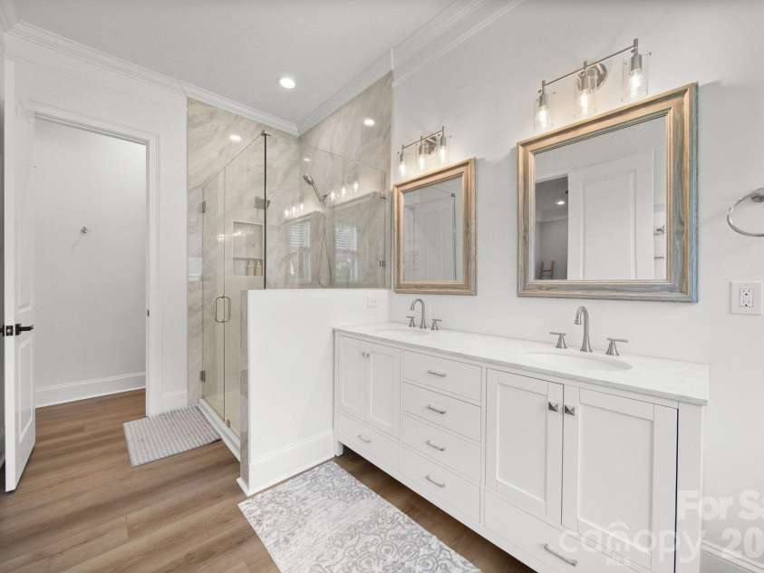 4035 Daugherty Road, China Grove, NC 28023.  MLS# CAR4417905, YatesRealty ID 50534. Custom tile shower and double vanities