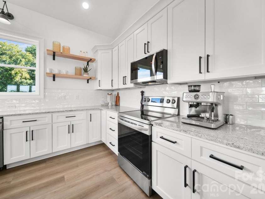4035 Daugherty Road, China Grove, NC 28023.  MLS# CAR4417905, YatesRealty ID 50534. Enjoy cooking while being able to see your animals from the large widows