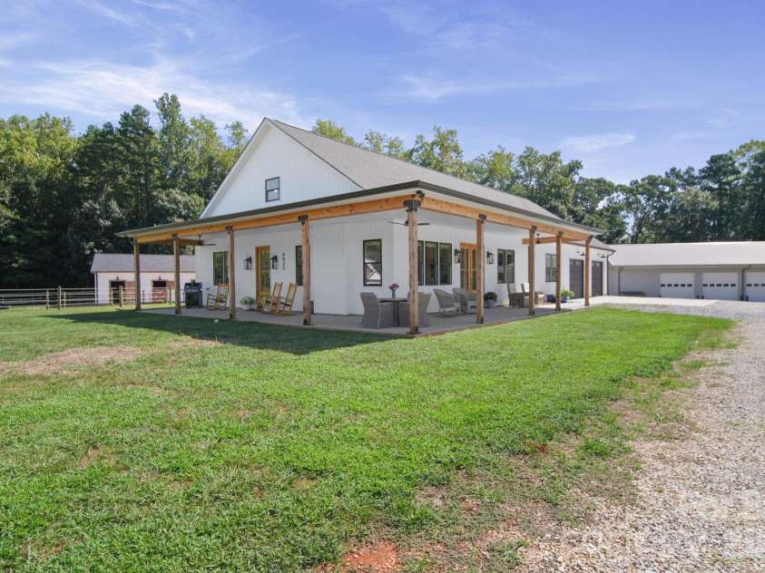 4035 Daugherty Road, China Grove, NC 28023.  MLS# CAR4417905, YatesRealty ID 50534. Enjoy sunsets from this massive covered porch