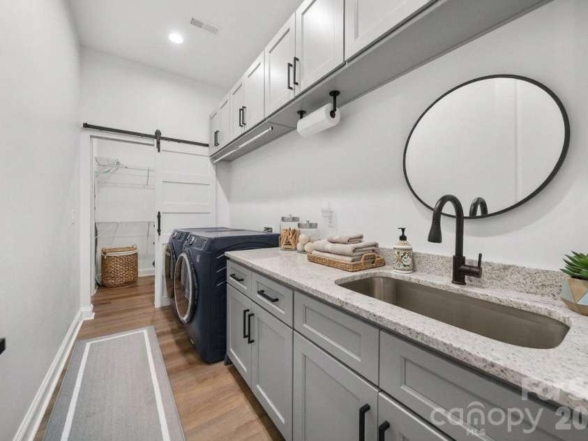 4035 Daugherty Road, China Grove, NC 28023.  MLS# CAR4417905, YatesRealty ID 50534. Laundry room goals! Storage, counter space and sink!