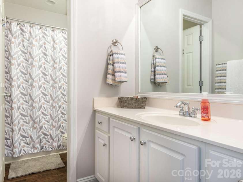 3401 Continental Drive, Monroe, NC 28110.  MLS# CAR4420024, YatesRealty ID 50540. Bathroom 2 with makeup area separate from tub and shower