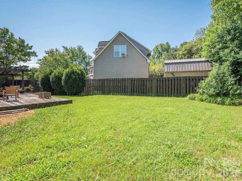 3401 Continental Drive, Monroe, NC 28110.  MLS# CAR4420024, YatesRealty ID 50540. Ready to host a get together?  Get out your cornhole set and start the grill...just in time for football season