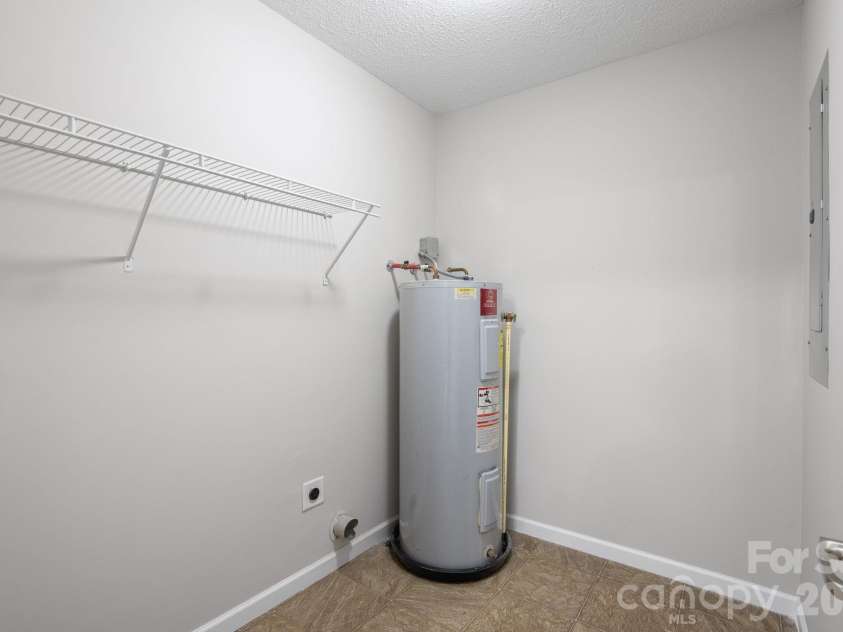 53 Newberry Drive, Fletcher, NC 28732.  MLS# CAR4411707, YatesRealty ID 50543. Laundry room