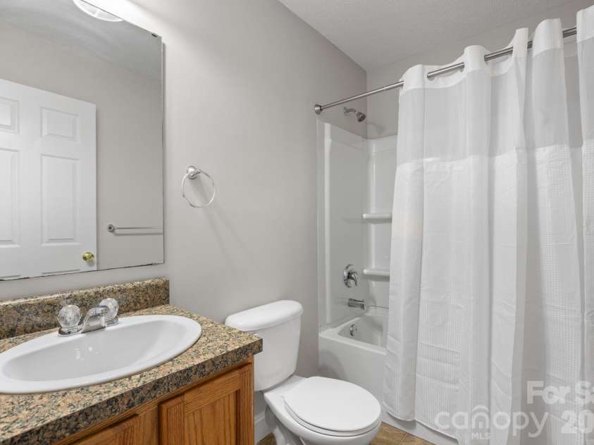 53 Newberry Drive, Fletcher, NC 28732.  MLS# CAR4411707, YatesRealty ID 50543. Second bathroom
