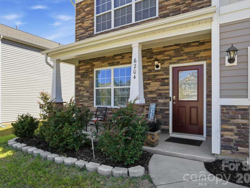 6204 Ellimar Field Lane, Charlotte, NC 28215.  MLS# CAR4422210, YatesRealty ID 50545. Exterior Front