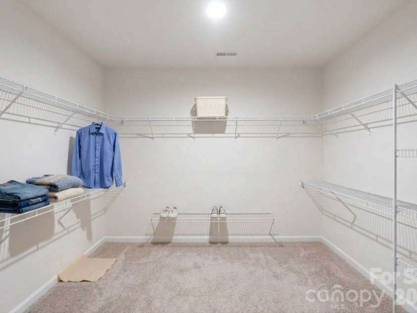 6204 Ellimar Field Lane, Charlotte, NC 28215.  MLS# CAR4422210, YatesRealty ID 50545. Master Closet