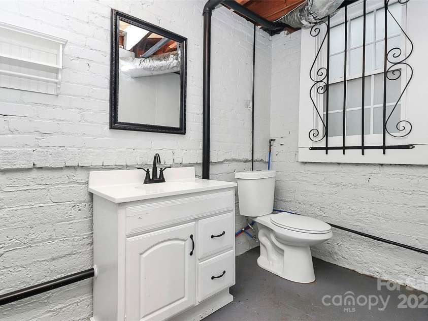 106 Patrick Street, Gastonia, NC 28054.  MLS# CAR4211369, YatesRealty ID 5055. 1/2 bath located in unfinished basement.