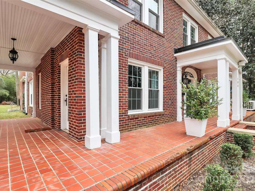 106 Patrick Street, Gastonia, NC 28054.  MLS# CAR4211369, YatesRealty ID 5055. Covered wrap around porches are perfect for enjoying the upcoming Spring days.