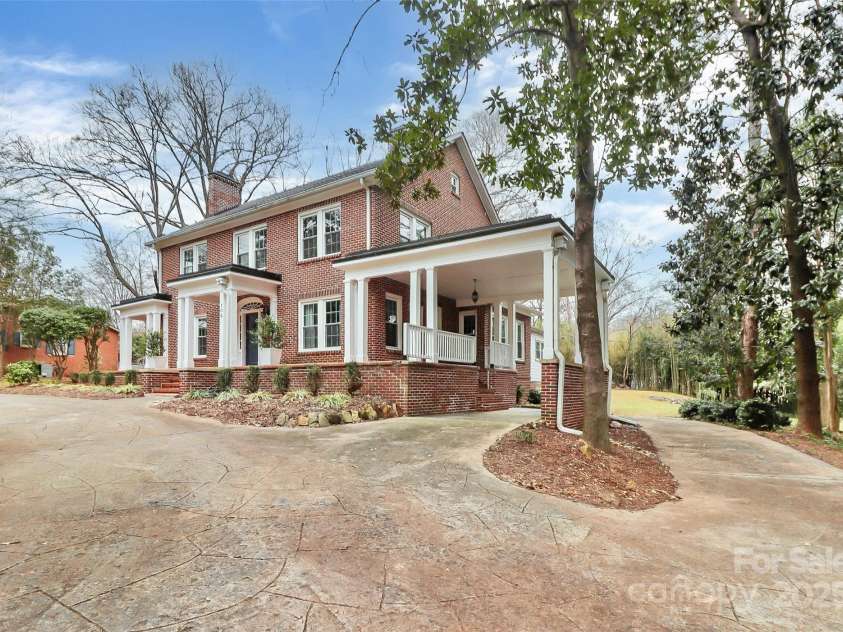 106 Patrick Street, Gastonia, NC 28054.  MLS# CAR4211369, YatesRealty ID 5055. Tons of parking including this beautiful porte-cochere.