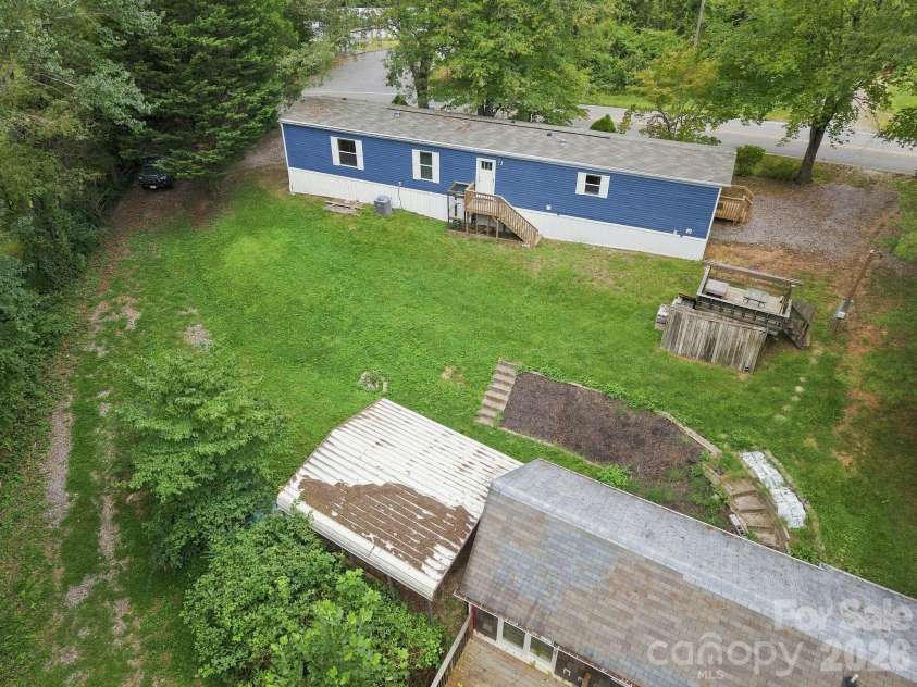 146 & 148 Bradshaw Circle, Candler, NC 28715.  MLS# CAR4424703, YatesRealty ID 50552. 2 Units on a Spacious Lot!