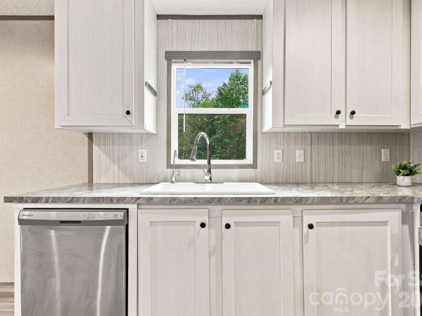 146 & 148 Bradshaw Circle, Candler, NC 28715.  MLS# CAR4424703, YatesRealty ID 50552. 