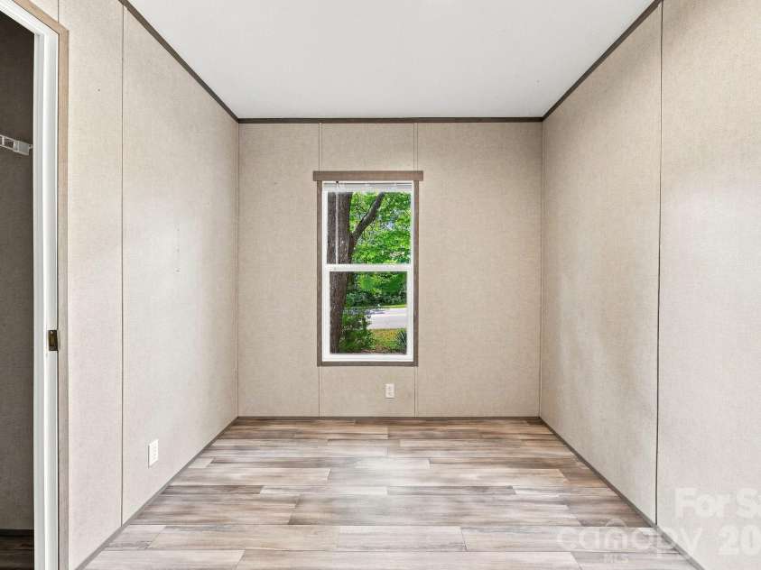 146 & 148 Bradshaw Circle, Candler, NC 28715.  MLS# CAR4424703, YatesRealty ID 50552. 