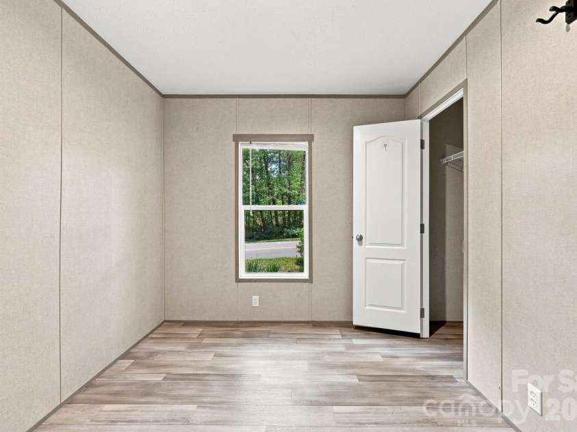 146 & 148 Bradshaw Circle, Candler, NC 28715.  MLS# CAR4424703, YatesRealty ID 50552. 