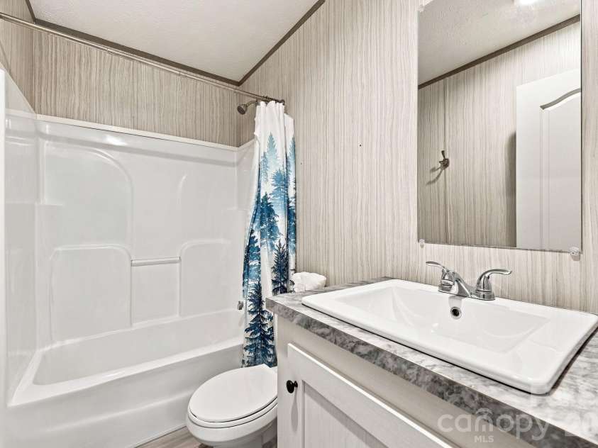 146 & 148 Bradshaw Circle, Candler, NC 28715.  MLS# CAR4424703, YatesRealty ID 50552. 