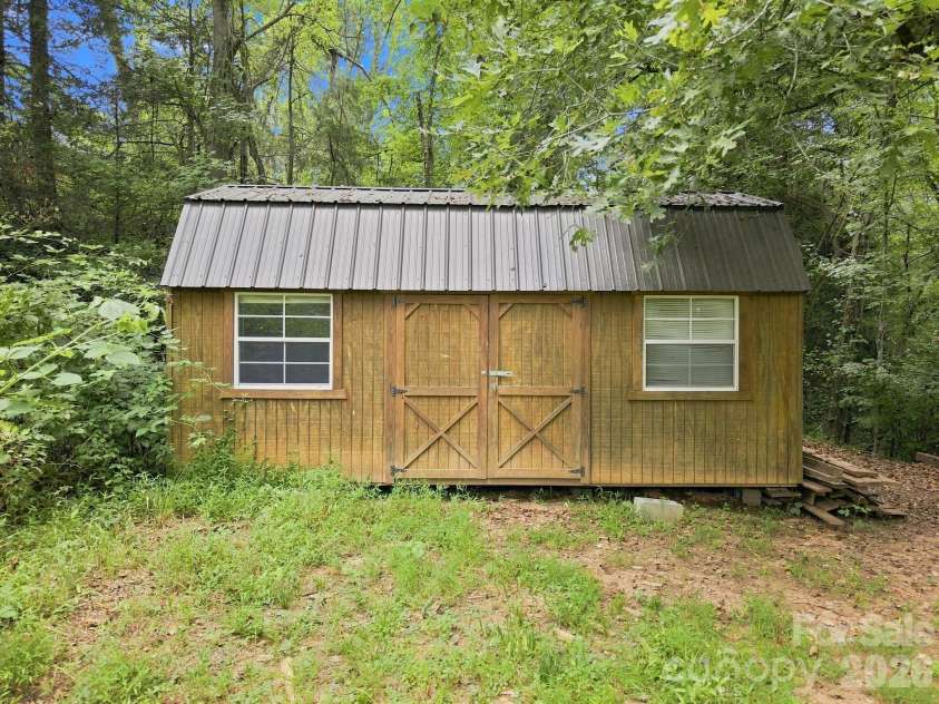 146 & 148 Bradshaw Circle, Candler, NC 28715.  MLS# CAR4424703, YatesRealty ID 50552. Also An Excellent Storage Building!