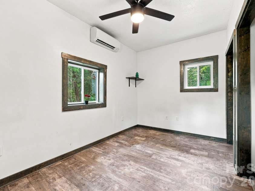 146 & 148 Bradshaw Circle, Candler, NC 28715.  MLS# CAR4424703, YatesRealty ID 50552. Large Bedroom!
