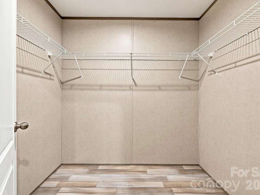 146 & 148 Bradshaw Circle, Candler, NC 28715.  MLS# CAR4424703, YatesRealty ID 50552. Large Walk-in Closet!