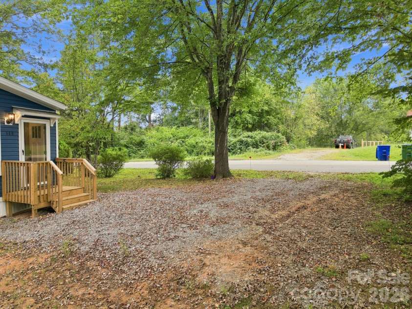 146 & 148 Bradshaw Circle, Candler, NC 28715.  MLS# CAR4424703, YatesRealty ID 50552. Plenty of Parking!