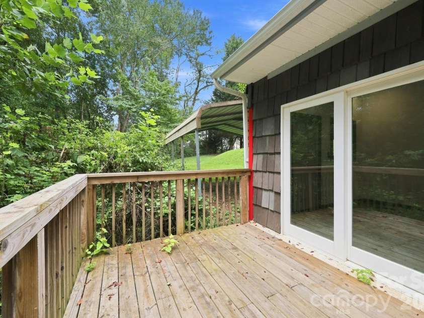 146 & 148 Bradshaw Circle, Candler, NC 28715.  MLS# CAR4424703, YatesRealty ID 50552. Walkout to Deck from Living and Kitchen Area