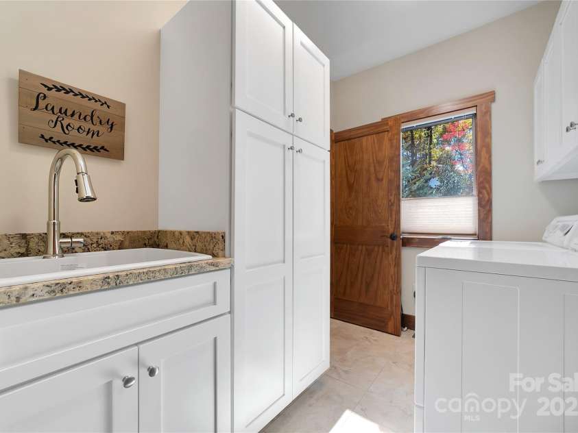 1291 Indian Camp Mountain Road, Rosman, NC 28772.  MLS# CAR4282700, YatesRealty ID 5056. Laundry